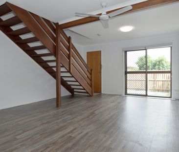 Fully Renovated Townhouse in the Heart of Gladstone Central! - Photo 1