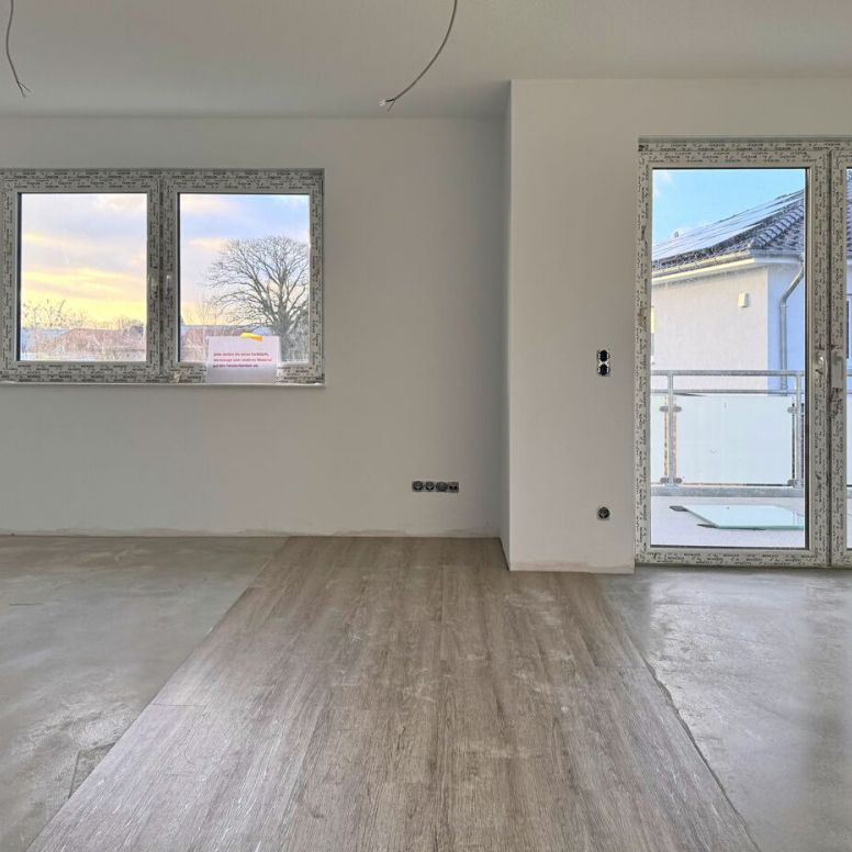 Ihr neues Zuhause: Neubau-Penthousewohnung mit Balkon inmitten von Remels - Uplengen - Photo 1