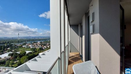 Stylische 1,5-Zi.-Wohnung mit Loggia & Rooftop Pool | TOWER HOMES im V22 - Photo 2