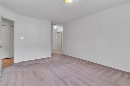 Spacious 55+ Condo with Elevator Access - Photo 5