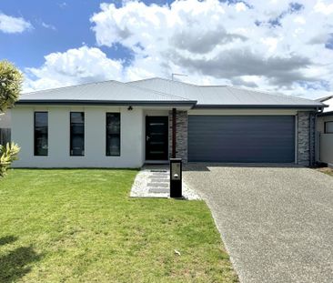 MODERN FAMILY HOME WITH MULTIPLE LIVING AREAS! - Photo 1