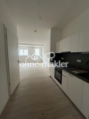 Erstbezug im Neubau 1-Zimmer-Wohnung mit Einbauküche E1-00-06 - Photo 1