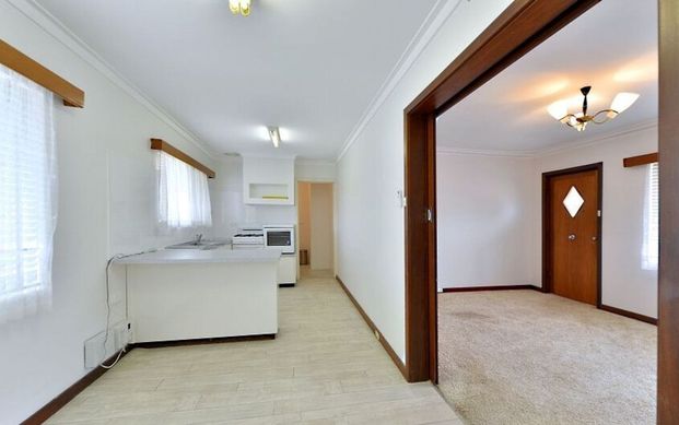 Centrally Located Family Home! - Photo 1