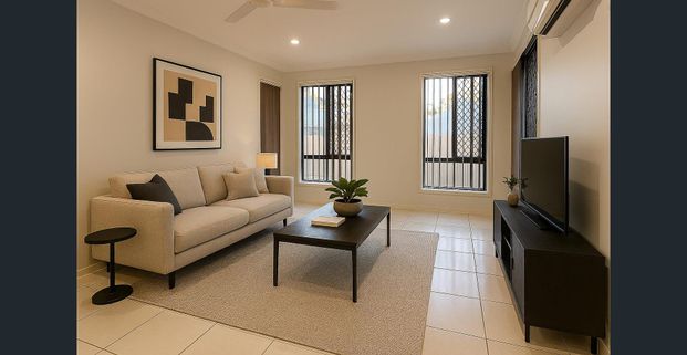 Stylish Lowset Home with New Carpets & Multiple Living Areas - Photo 1