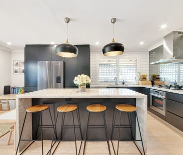 Beautifully Renovated and Exceptionally Convenient Three-Bedroom Home - Photo 1