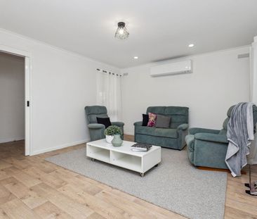 Beautifully Maintained 3-Bedroom Home with Sunroom & Large Backyard - Photo 6