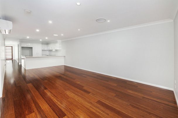 Spacious Family Home with Low-Maintenance Living - Photo 1