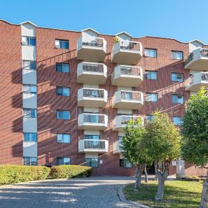 3 1/2 FRAIS PEINT SAINT-LAMBERT (IMMEUBLE BÉTON) - Photo 2