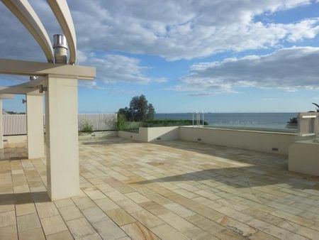 HIGH ON QUALITY AND OUTSTANDING BEACH-SIDE LOCATION! - Photo 4