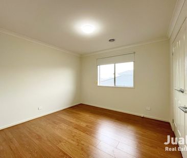 Spacious 4-Bedroom Gem with Contemporary Charm - Photo 5