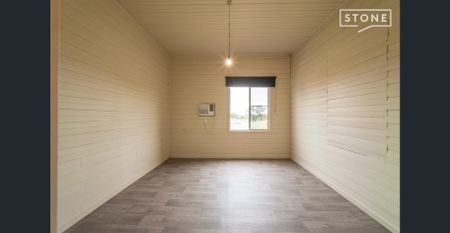 Two bedroom home with lawn maintenance included - Photo 2