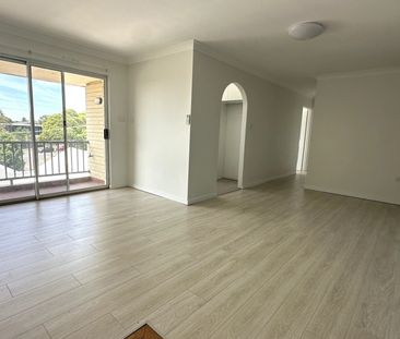 FULLY RENOVATED FLOOR 2 BEDROOM UNIT 500M TO AUBURN STATION - Photo 2