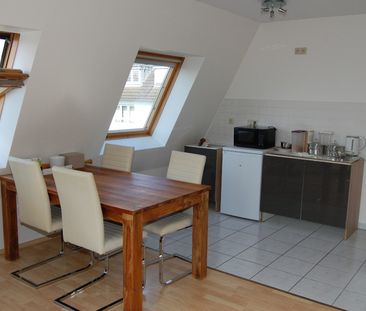 Moderne und helle 2-Zimmerwohnung mit Dachterrasse in schöner Wohnlage! - Foto 4