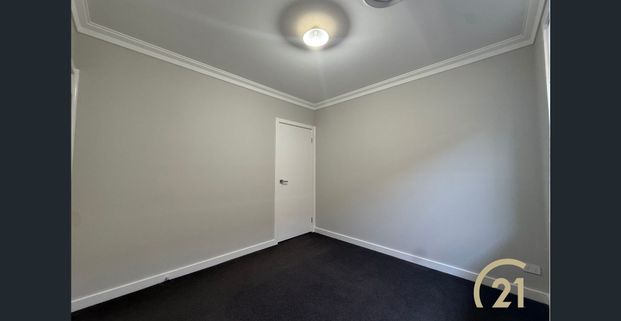 Modern 4 Bedroom Family Home! - Photo 1