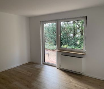 Moderne, gepflegte Wohnung mit Garten und Garage in erstklassiger Lage - Foto 1