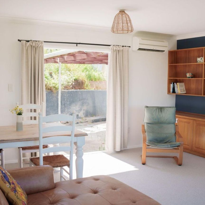 Sunny Elevated Home Near Tahunanui Beach – Privacy, Views and Character - Photo 1