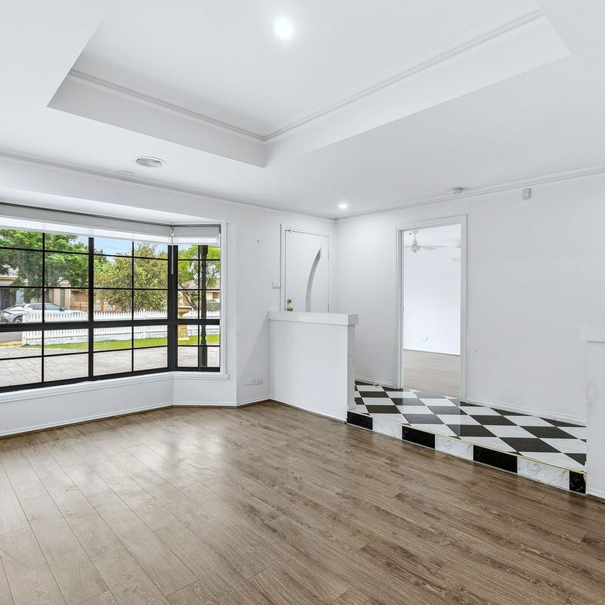 Light-Filled Family Home with 2 Living Spaces in Prime Altona Meadows Location - Photo 1