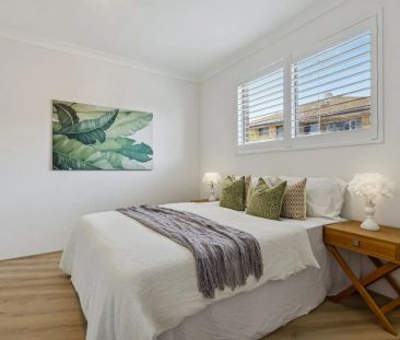 Spacious with Stylish Interiors, Ultra-Convenient 2 bedroom Unit - Photo 1