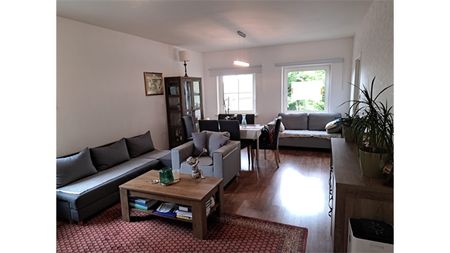 Een appartement op de eerste verdieping met garage en tuintje - Foto 2