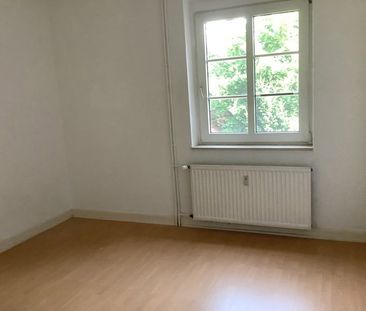 Schöne Erdgeschosswohnung in denkmalgeschütztem Haus! - Foto 5