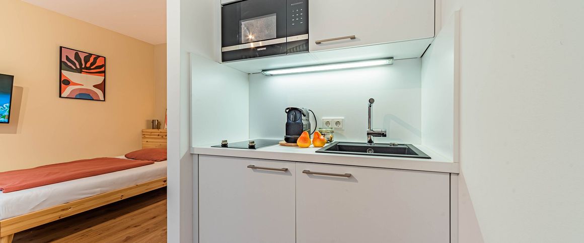 City-Residence: Gepflegtes 1-Zimmer-Apartment mit W-LAN und Reinigungsservice - Foto 1