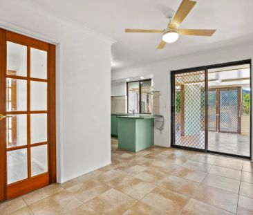 Freshly painted home with large gardens and versatile living spaces. - Photo 1