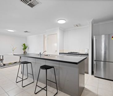 Immaculate 4x2 Family Home with Multiple Living Areas - Photo 2