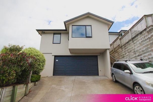 Stunning Executive Home with Sweeping Views and Sunlit Living - Photo 1