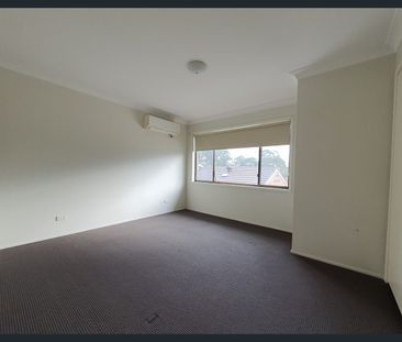 Two Bedroom Townhouse With Air Conditioning - Photo 1