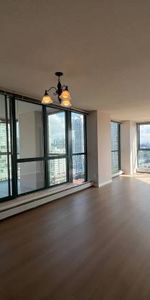 Stunning 2 Bed, 2 Bath, Den, Parking Stall, Balcony, Storage Locker - Photo 4