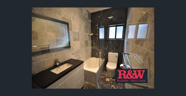 Well-Maintained Family Home with Double Garage - Photo 1