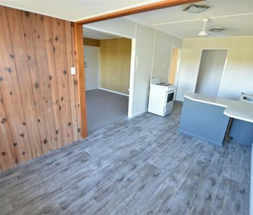 Spacious Family Home with Huge Yard, Side Access & Plenty of Storage! - Photo 4