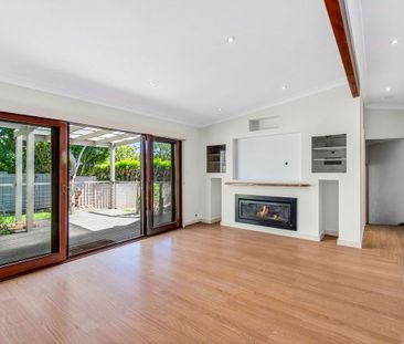 LIGHT-FILLED FAMILY RETREAT OFFERING SPACE AND CONVENIENCE - Photo 1