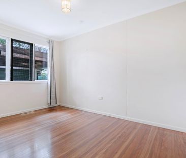 Spacious 3-Bedroom Unit with Large Fenced Yard! - Photo 4