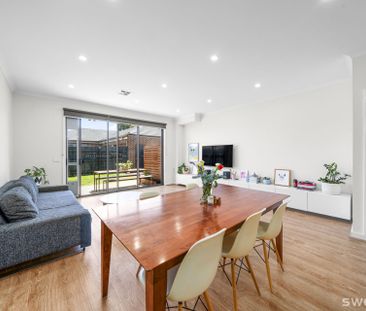 Light-Filled Three-Bedroom Townhouse in a Convenient Location - Photo 1