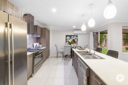 Stylish Family Living with Multiple Living Zones & Beautiful Outdoor Entertaining - Photo 4