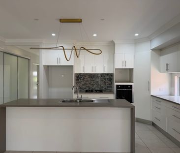 MODERN 4 BEDROOM, 2 BATHROOM HOME IN IDALIA + POOL + SEPARATE LIVIN... - Photo 5