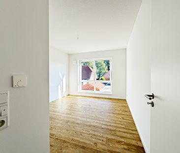 Exklusive Dachgeschosswohnung mit Wärmepumpe und PV-Anlage! - Foto 2