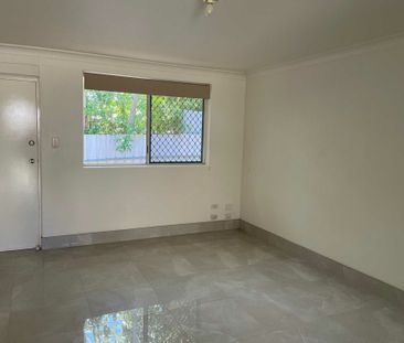 Low-Maintenance Unit | Walk to Shops & Transport | Built-In Robes |... - Photo 5