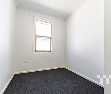 Spacious 4-Bedroom Home with Modern Touches - Photo 3