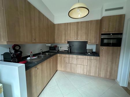 Gelijkvloers 2 slaapkamer appartement met tuin en garage. - Photo 5