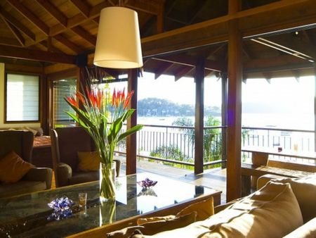 WATERFRONT BALINESE-STYLE OASIS - 8 MONTH LEASE! - Photo 3