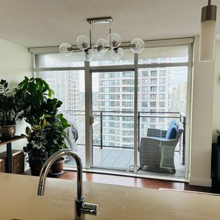 22nd Floor Bright Southwest Facing Corner Unit with 2 Bedrooms & a Den - Photo 4