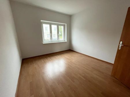 Gepflegte 3-Zimmer-Wohnung mit EBK, stadtnah gelegen! (AK-614) - Photo 2