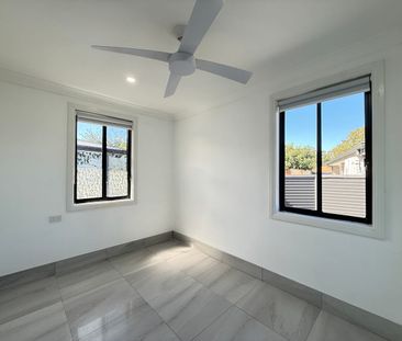 Modern & Spacious 3-Bedroom Home - Photo 2