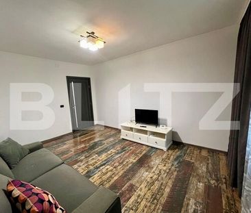Apartament cu 2 camere, parter, centrala si AC, zona centrala - Fotografie 2