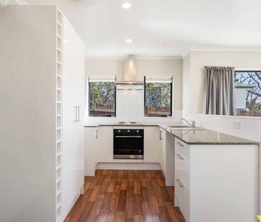 This beautifully renovated three-bedroom home in Ranui is ready for... - Photo 4