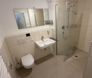 Neubau mit Stil – lichtdurchflutete 1-Zimmer-Wohnung in urbaner Lage - Photo 3