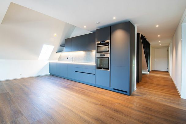 Moderne Maisonette-Wohnung im Herzen von Nänikon - Foto 1