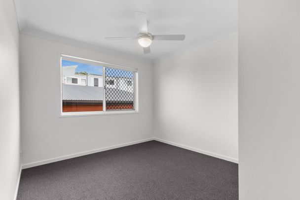 BRAND NEW four bedroom home with two living areas and solar panels! - Photo 1